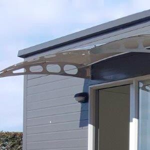 Detail of exterior awning over cabin ranch slider